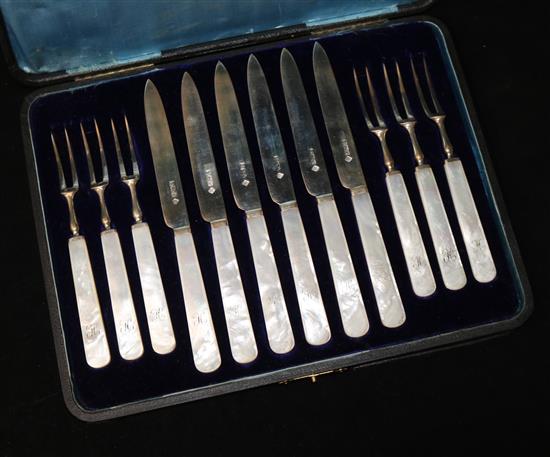 A cased set of six pairs of mother of pearl handled silver dessert eaters by Martin Hall & Co,